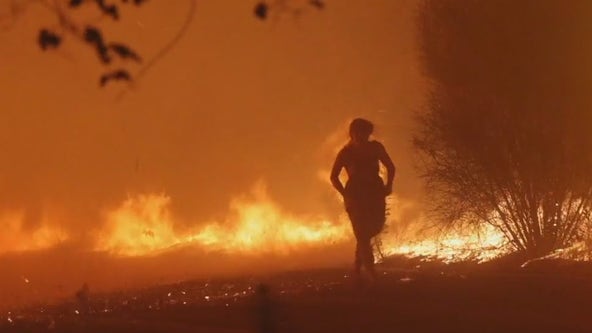 Woman flees Airport Fire in Orange County