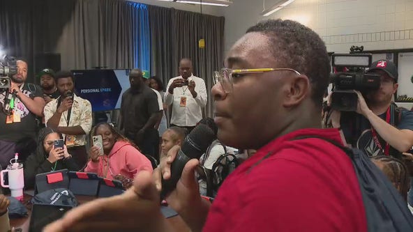 Usher visits Detroit's Boys and Girls Club