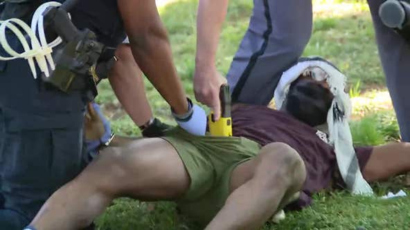 Protester shot with Taser during Emory protest