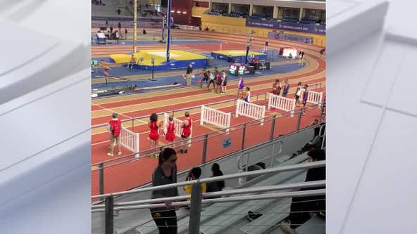 Track team sets record despite athlete colliding with wandering official