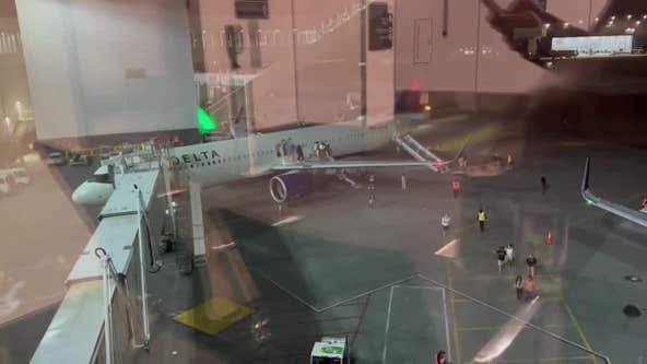 Delta plane evacuated after catching fire at Sea-Tac Airport