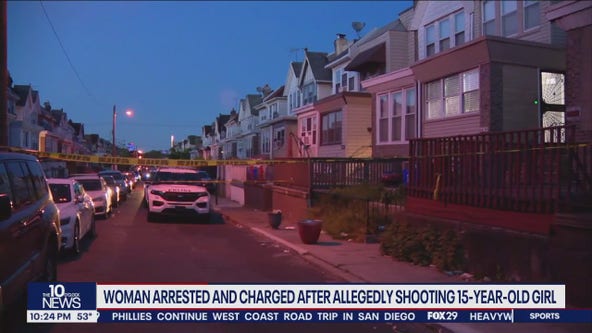 15-year-old girl shot in head after argument; woman in custody