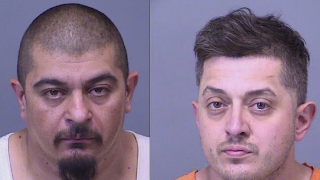 2 brothers arrested after man found in burning truck