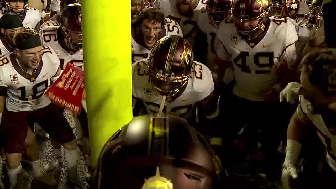 Gophers celebrate on field after beating Wisconsin 23-16, keeping Paul Bunyan's Axe