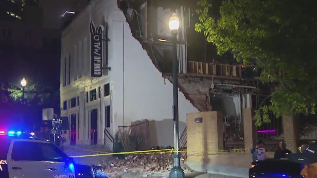 Texas weather: Houston storms tear side off building