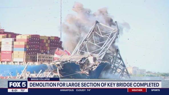 Part of Baltimore Key Bridge collapses in explosive demolition
