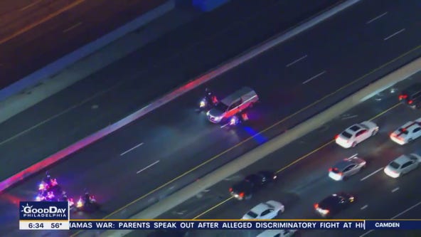 Philadelphia police motorcade escorts fallen officer after airport shooting