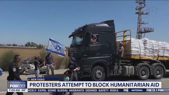 Protesters attempt to block humanitarian aid to Gaza