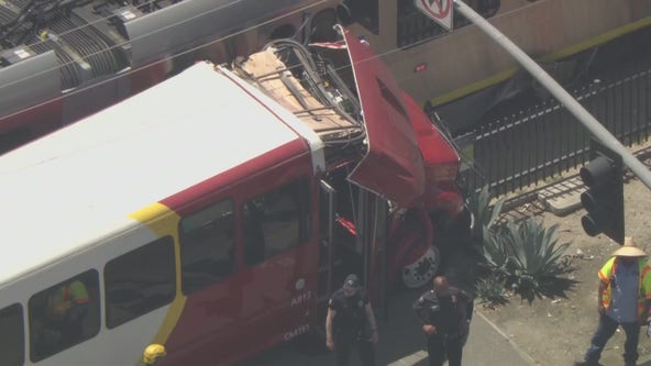 Multiple injuries reported after bus, train crash