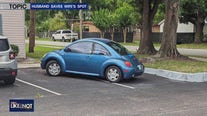 Husband saves wife's spot -- by double-parking