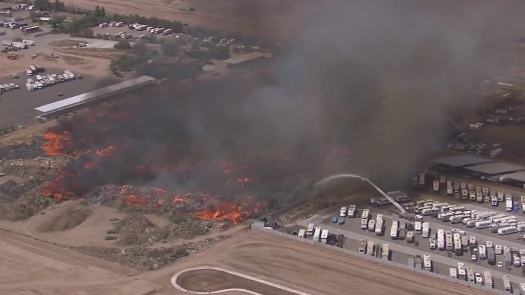 Crews battle large mulch fire in Mesa