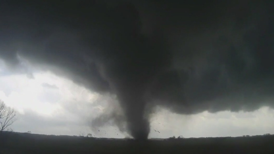 Dozens of tornadoes sweep across Midwest