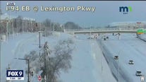 Snow-covered roadways Saturday after blizzard-warned storm
