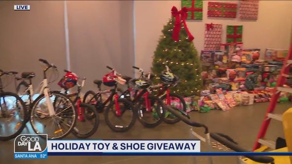 Holiday toy and shoe giveaway