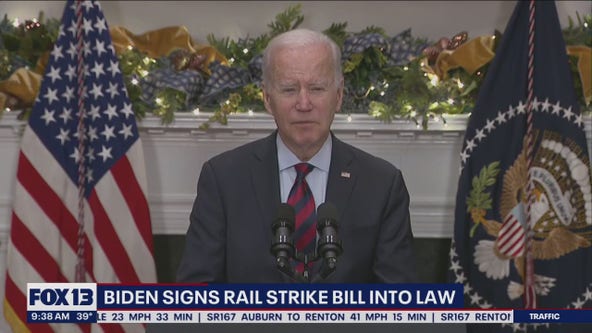 Biden signs rail strike bill into law