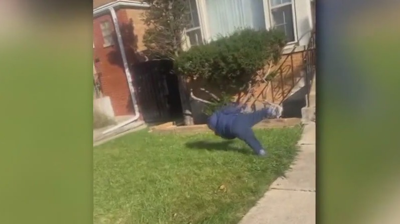 Child attempts cartwheel and fails