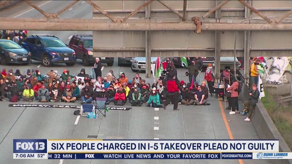6 people charged in I-5 takeover plead not guilty