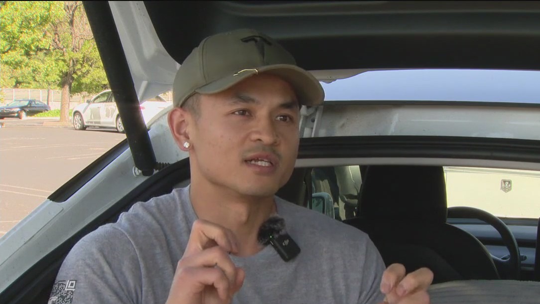 Laid-off Tesla employee shares story of living in car at factory