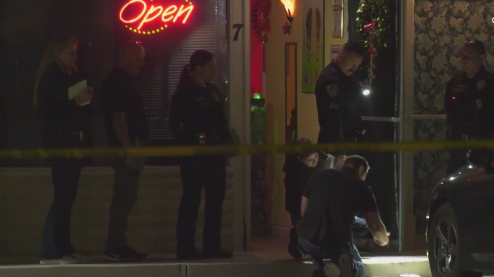 Robbery suspect shot at massage parlor