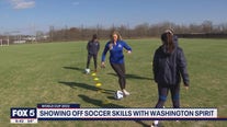 Claire shows off her soccer skills with Washington Spirit