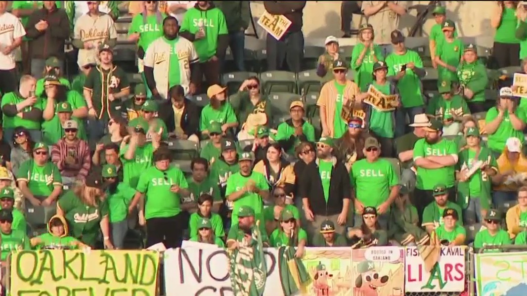 Oakland A's investigating why fans wearing SELL t-shirts escorted from game