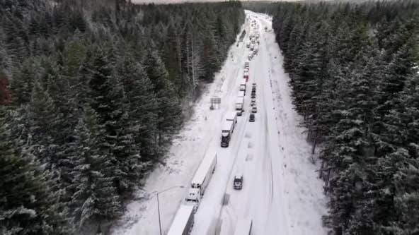 Drone video shows traffic stopped on I-90 over Snoqualmie Pass