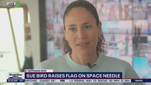 Sue Bird raises flag atop Space Needle