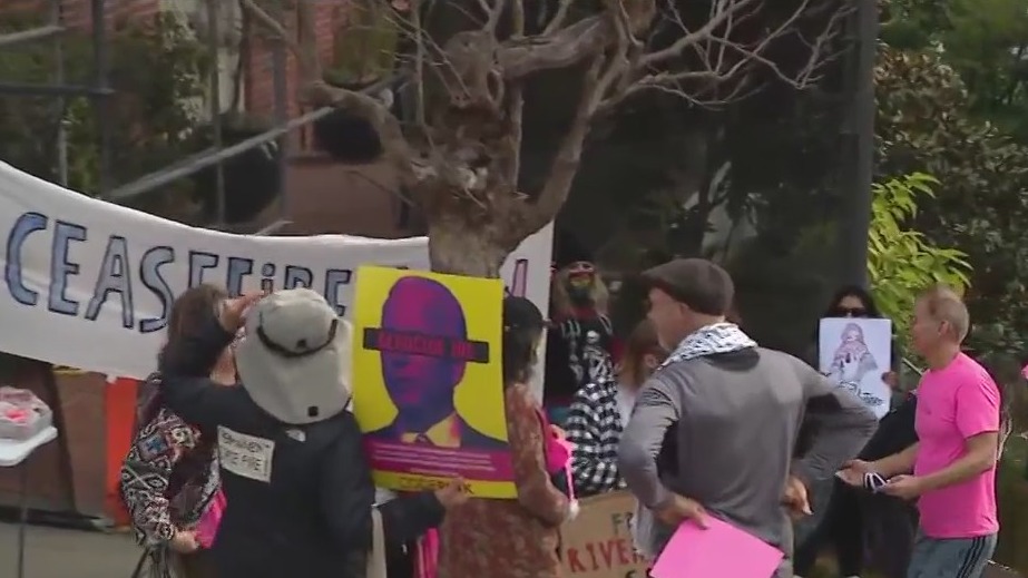 Anti-war protesters rally outside Rep. Nancy Pelosi's home