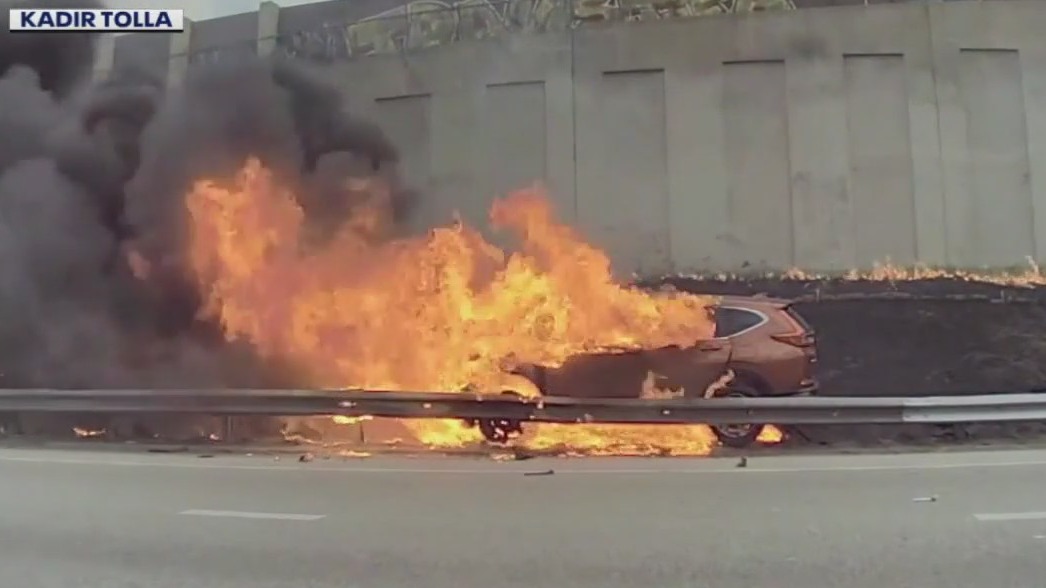 I-94 burning car rescue caught on video