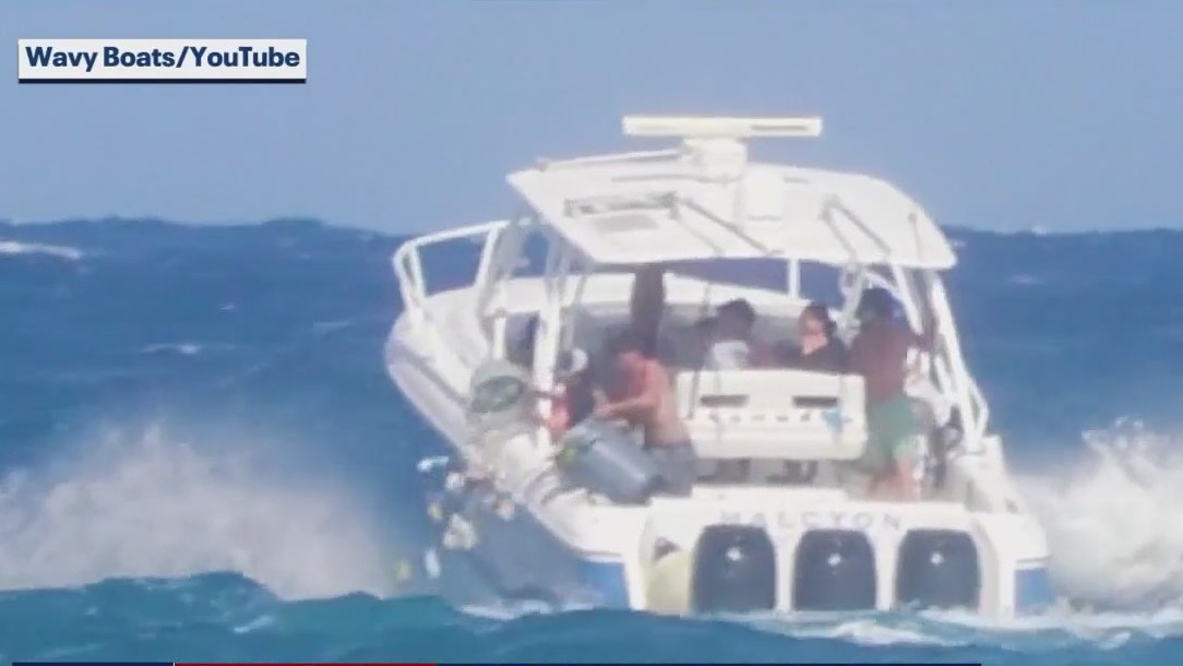 Boaters appear to dump trash into ocean