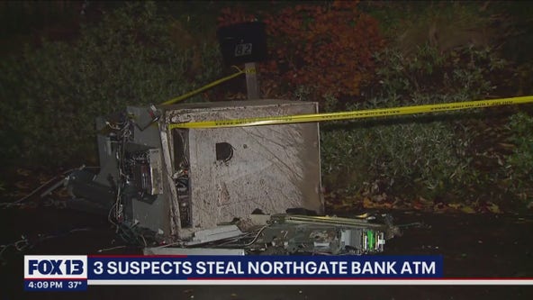 Suspects rip ATM out of wall at Seattle bank; tow it behind van bashing into cars