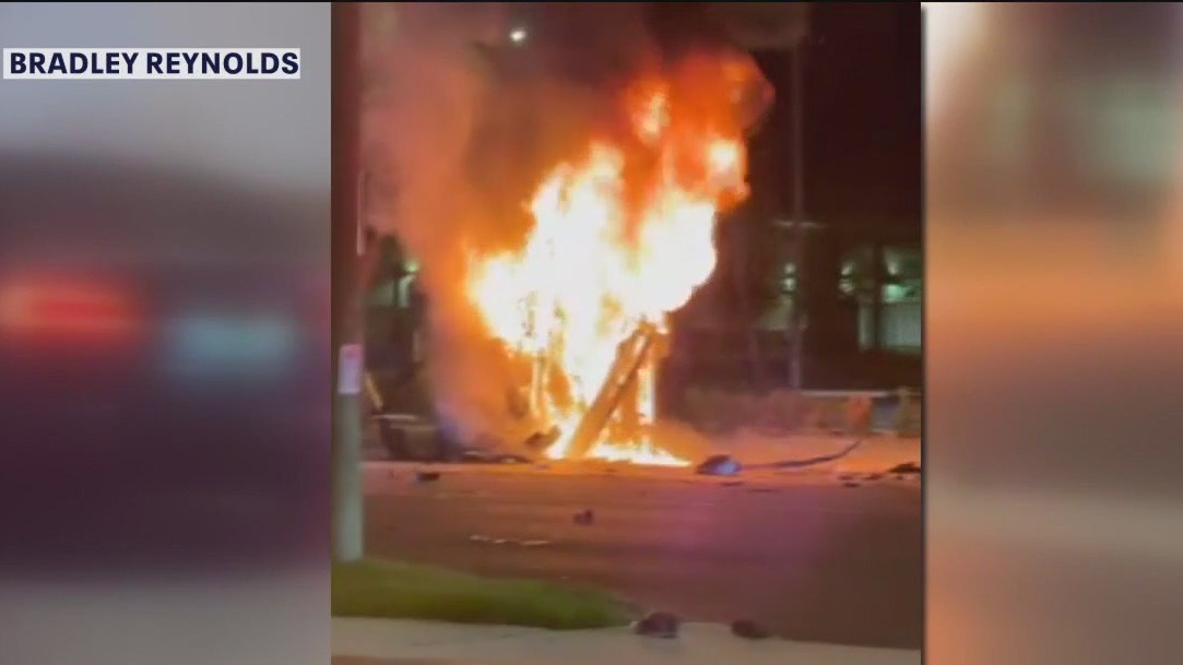 3 rescued from burning car in Tampa