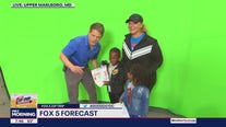 Tucker and fans do the weather!