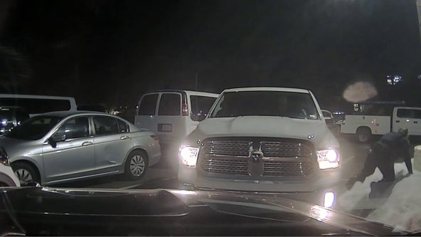 Dash cam: Driver strikes Woodbury police officer, squad car
