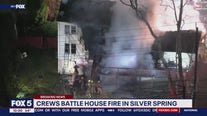 Crews battle house fire in Silver Spring