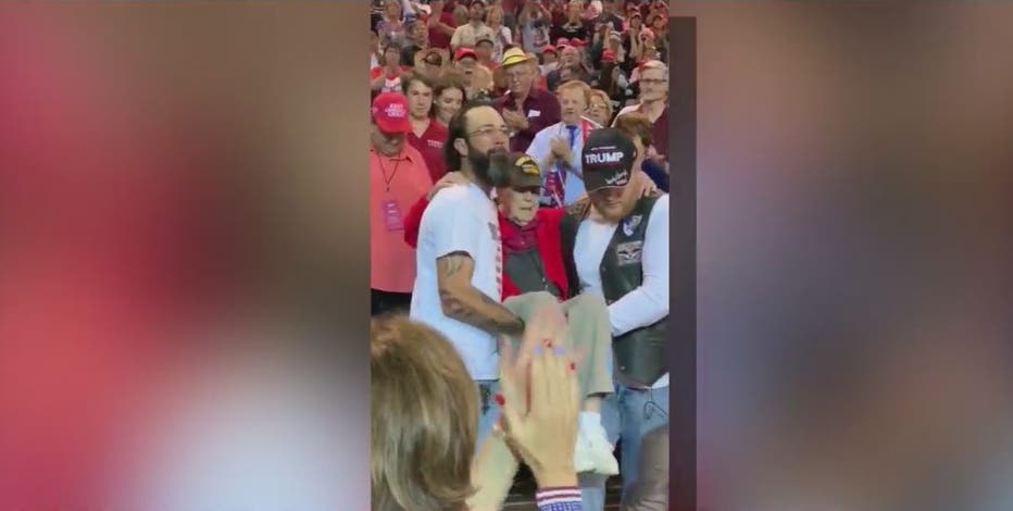 WWII veteran carried to his seat by fellow Trump supporters at Phoenix campaign rally