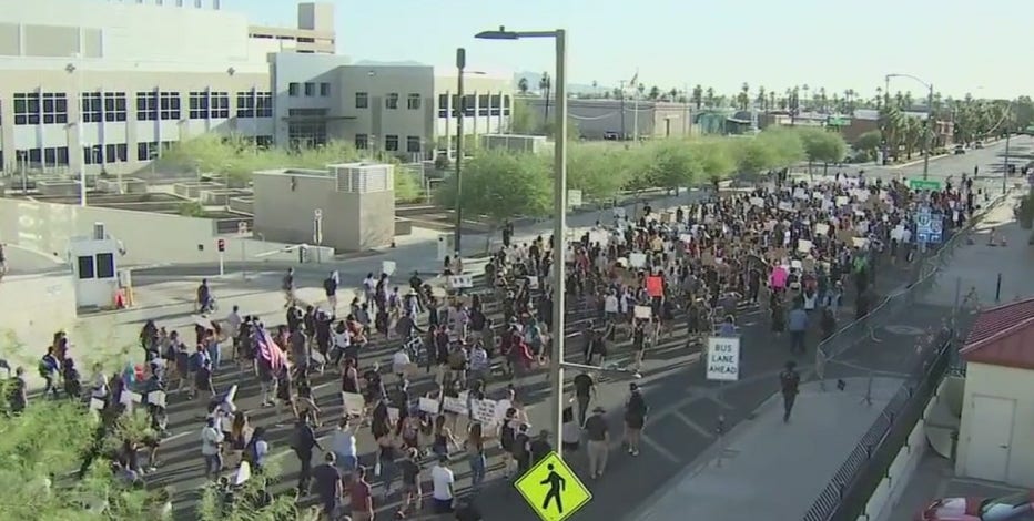 Hundreds take the streets of downtown Phoenix for a 17th consecutive day of protests