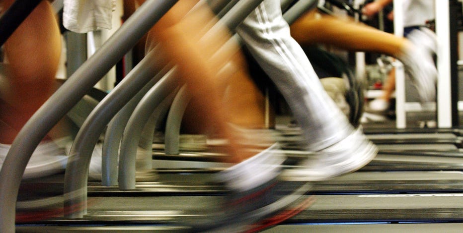 Arizona's reported virus cases fall as gym standoff sharpens
