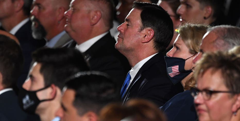 Governor Doug Ducey pushes masks but goes without in big crowd