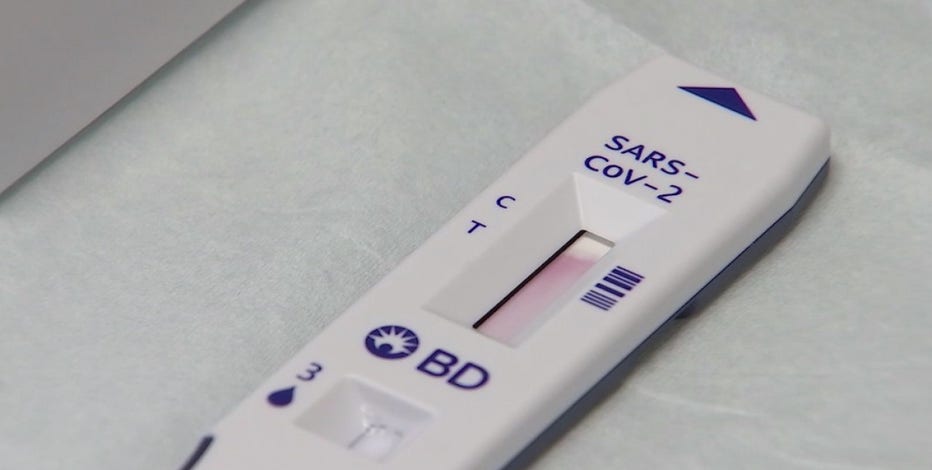 People rush to take COVID-19 tests amid holidays and surge in new cases