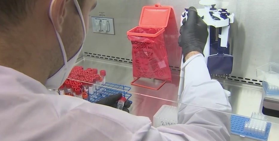Behind the scenes at a COVID-19 testing lab