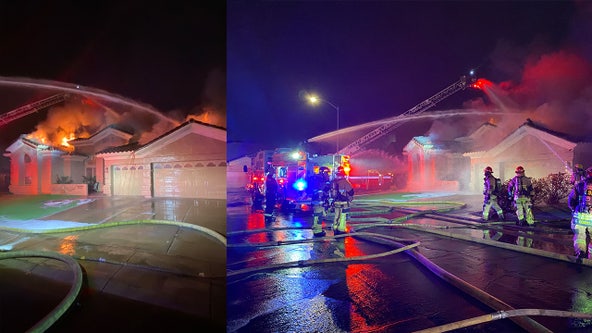 Phoenix, Scottsdale firefighters knock down flames coming from a home's roof