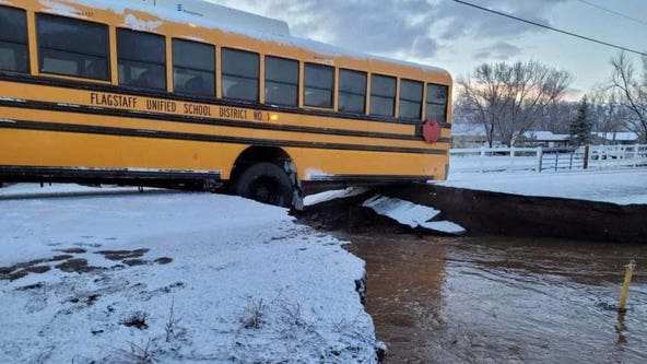 Flagstaff school bus gets stuck in sinkhole as recent storms put immense pressure on area infrustructure