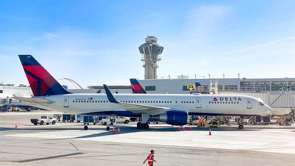 Passenger detained at LAX after opening emergency exit door of plane