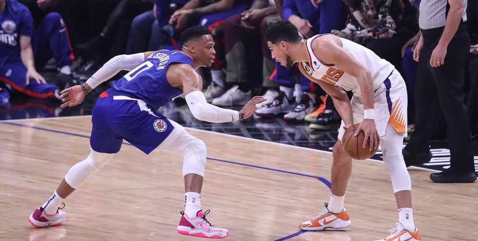 Booker has 45 points, Suns top Leonard-less Clippers 129-124