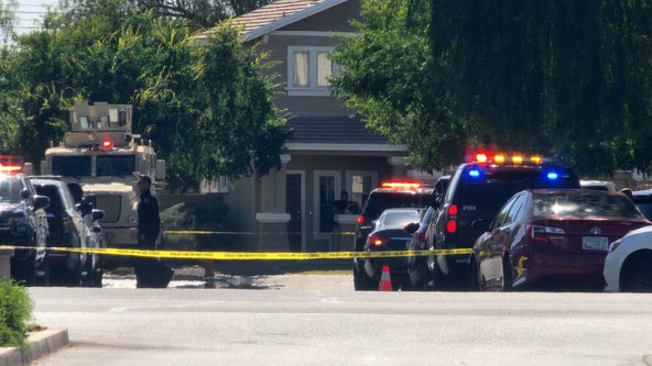Woman killed, man arrested following Avondale barricade situation, police say