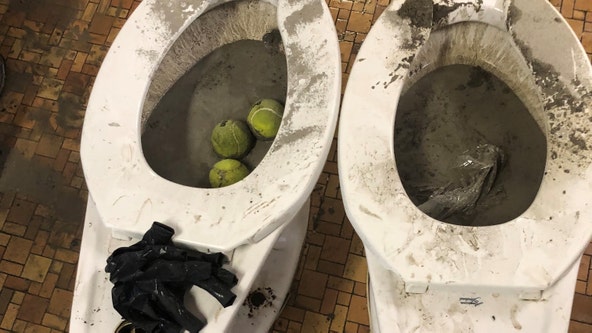 School district presses charges after students cemented toilets in 'senior prank'