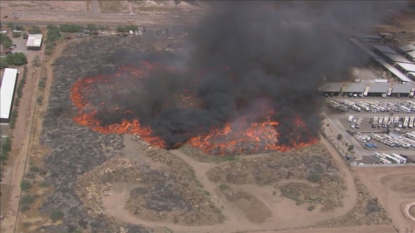 Mulch fire in Mesa now contained, but it's still sending smoke into the air