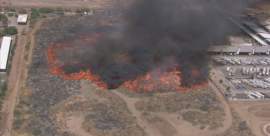 Mulch fire in Mesa now contained, but it's still sending smoke into the air
