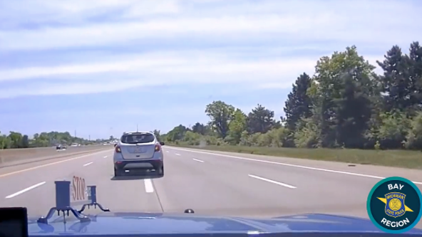 VIDEO: 10-year-old in stolen car swerving on I-75 pulled over by MSP